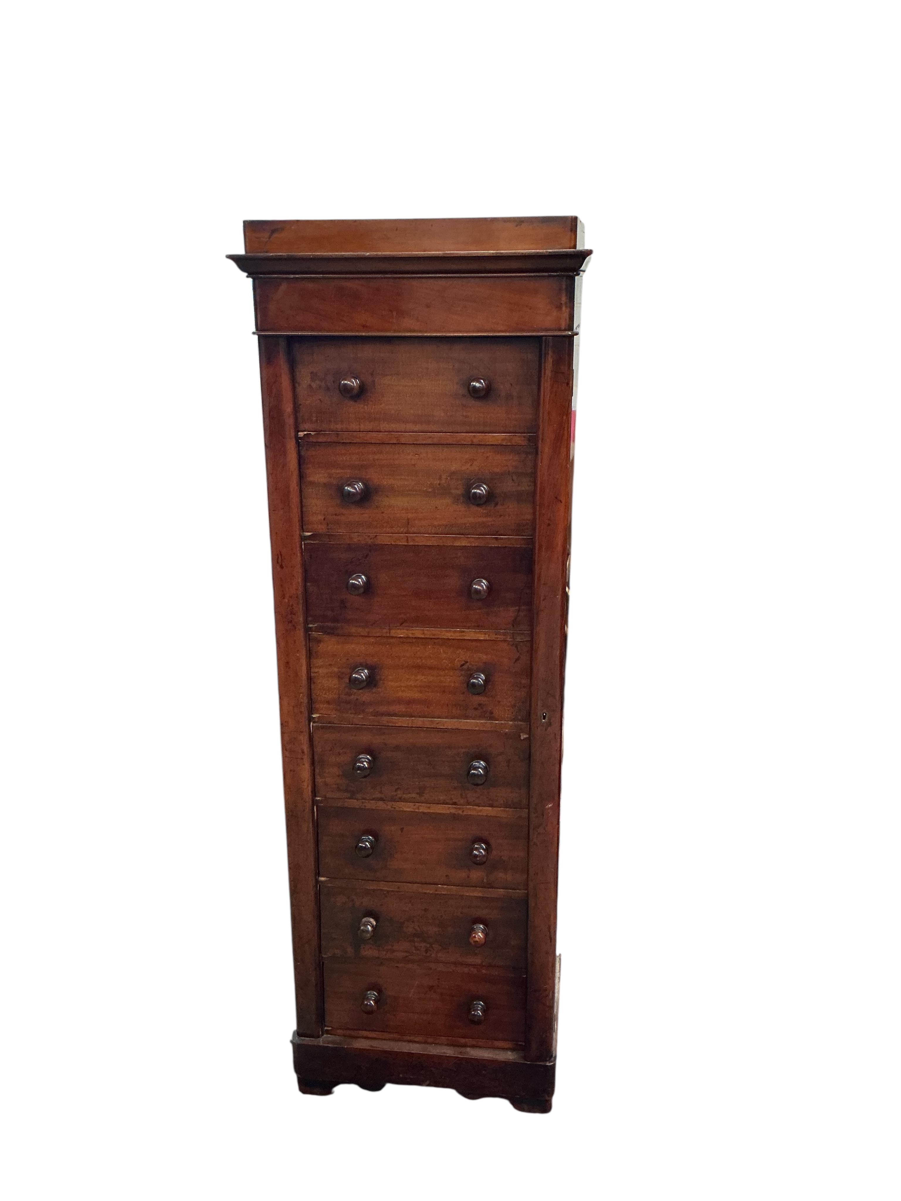 A Victorian mahogany Wellington chest, width 53cm, depth 35cm, height 158cm